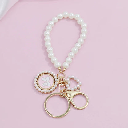 Charm Sac Perles Métal Doré